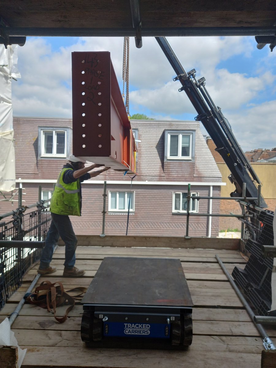 SFinnieLtd's tweet photo. Tracked carrier at work! 
Lifting steel beams onto a loading platform, then tracking them into position across the building, with each beam weighing over 1700kg.

#steelwork #construction #hiab #lorry #crane #london https://t.co/VvsmHAWvfU