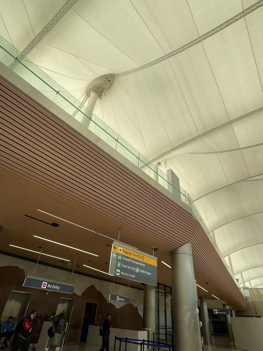 QPCFinishing's tweet photo. On todays episode of When Work Follows You- always exciting to step off of the tram at Denver International, hopping on the escalators up to baggage claim with all of my fellow travelers and looking up and seeing our beautiful wood grain powder coating above my head.  Smile. https://t.co/2hjrtmR7cu