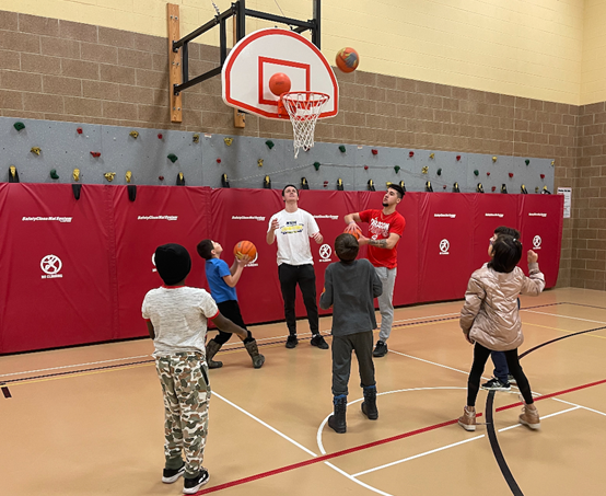 Members of the <a href="/MSUM_MBB/">MSUM Men's Basketball</a> visited Mrs. Carlson's physical education classes at Jefferson Elementary School. The collegiate hoopsters taught the students about the game of basketball and gave them tips for how to improve as basketball players. (Photo courtesy Beth Olson)