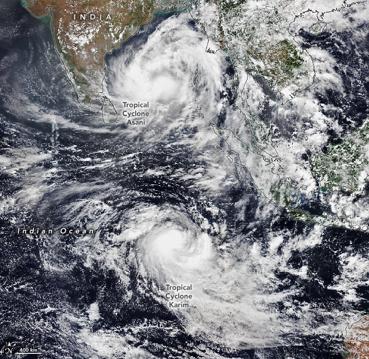 NASAEarth's tweet photo. The pair of weakening storms probably will not bring catastrophe to land, but they lined up and put on a show for satellites. https://t.co/LkqOkvBv88 https://t.co/IUAglzBFPK