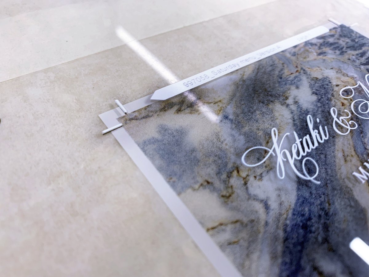 GSBDigital's tweet photo. Look closely to see an example of 1st surface and 2nd surface printing on clear acrylic in action. This menu's background was printed 2nd surface and finished with a 1st surface pass of white ink for the text. Learn more: https://t.co/RzuqQdbKC4 #digitalprinting https://t.co/8zfscRDoRY