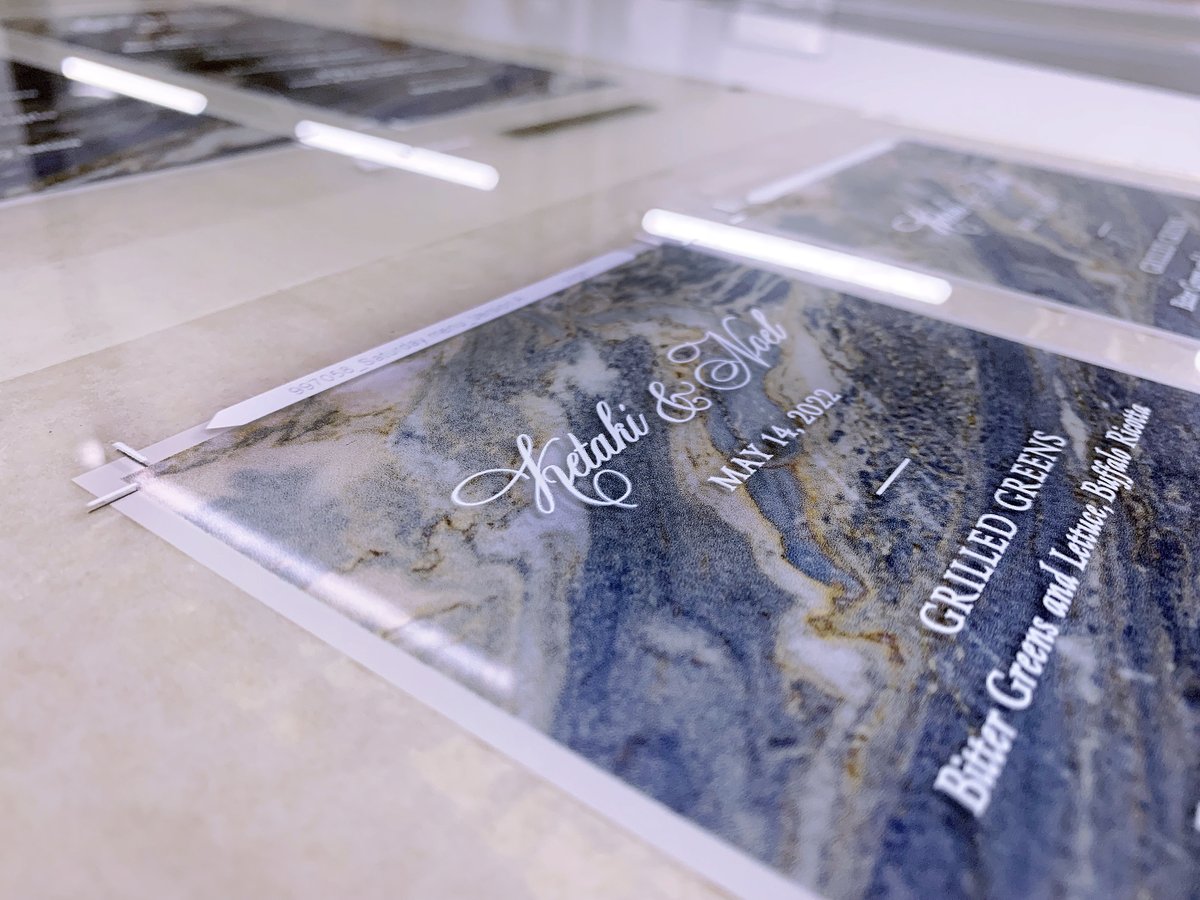 GSBDigital's tweet photo. Look closely to see an example of 1st surface and 2nd surface printing on clear acrylic in action. This menu's background was printed 2nd surface and finished with a 1st surface pass of white ink for the text. Learn more: https://t.co/RzuqQdbKC4 #digitalprinting https://t.co/8zfscRDoRY