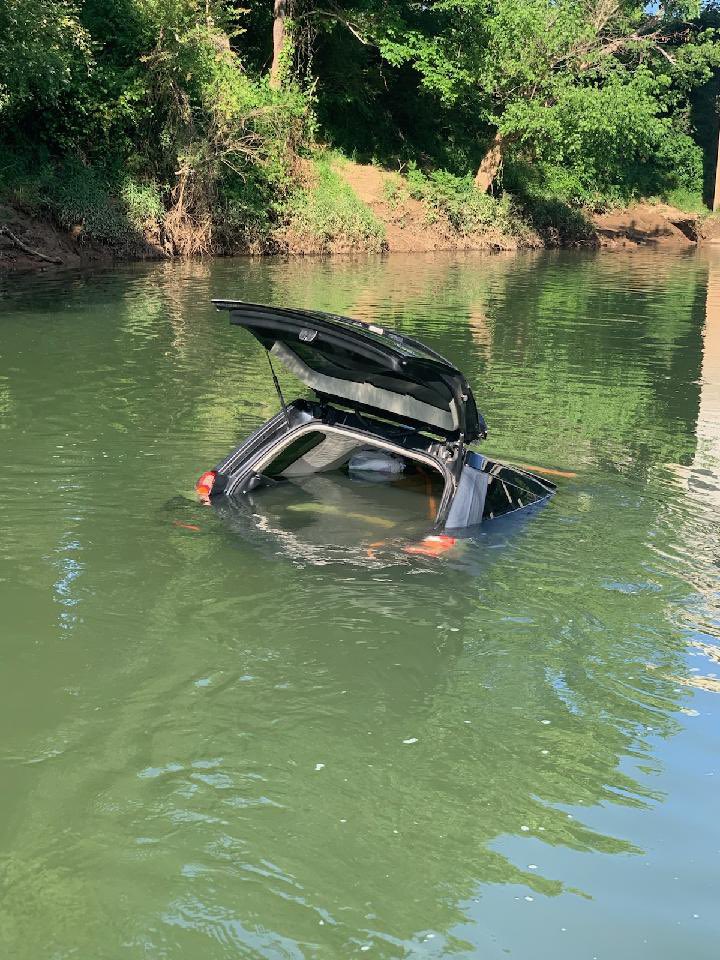 FloydPolice's tweet photo. A vehicle was submerged in the Etowah River today near the soccer fields. Police and 911 are aware; it will be removed tomorrow. https://t.co/cQ74j2kLfx
