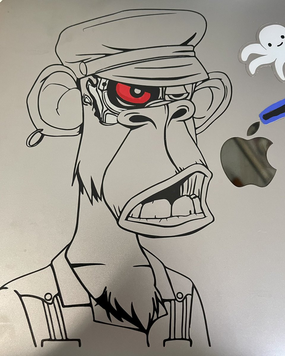 Wifey made me a little something for my MacBook. Used her Cricut to make my <a href="/BoredApeYC/">Bored Ape Yacht Club 🍌</a> Cyborg come to life! #BAYC #6860 #cricut