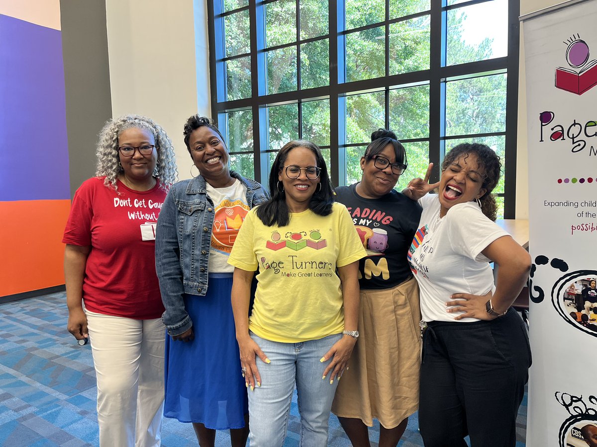 JenWinSaunders's tweet photo. It’s #TShirtTuesday 👚 😃 Happy to have my fellow @APSMediaServ colleagues with me today! #dontgetcaughtwithoutabook #librarymediaservices #pageturnersmakegreatlearners #readingismyjam #yesireallydoneedallthesebooks https://t.co/DkJnmhKPQ1