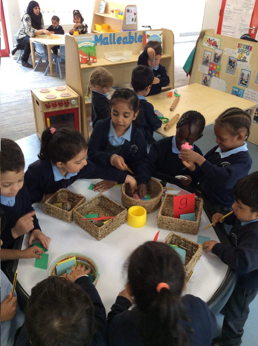 MissWilson9's tweet photo. The children in nursery loved using our phonics tuff tray set up today. We were sorting sound cards and objects by initial sounds as well as having a go at writing the sounds. #cravenwoodeyfs #eyfs #earlyreading https://t.co/ygyFm26jQh