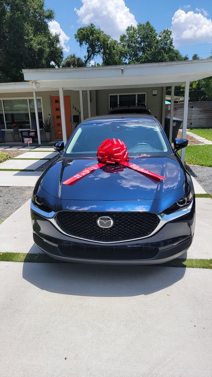 Kevinwr450's tweet photo. Always wanted to pull the Lexus Christmas commercial in my driveway. My daughter's CX 30 finally came in after 2 months a a bait n switch from another dealer. Thanks @join_yaa you all the useful info. #madza #cx30 https://t.co/kNOeR5AstB