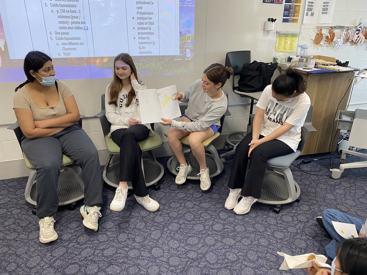MmeMoritz's tweet photo. French 273 students enjoying story time by reading their versions of If You Give A Mouse A Cookie in French. Bravo ! @Glenbrook_south #GBSNow #D225Now #FrenchMatters https://t.co/cjMPAFXNC4