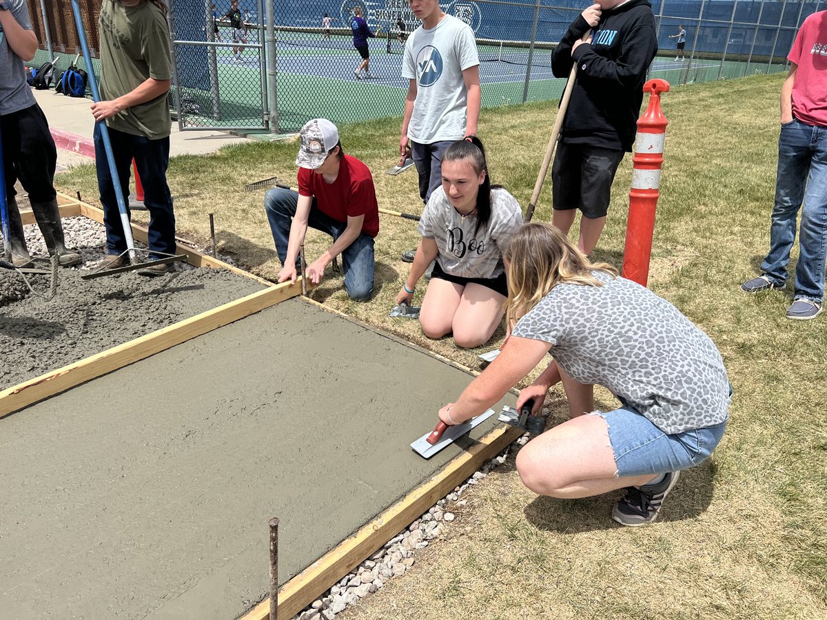 THEfremonthigh's tweet photo. The Fremont Construction Class was out doing some hands on learning today. They poured the base for a new shed. It will belong to the Boys & Girls Tennis programs to store equipment once completed. 🙌 #CTE #ConstructionClass #PackisBack https://t.co/xj5hs5d3V5
