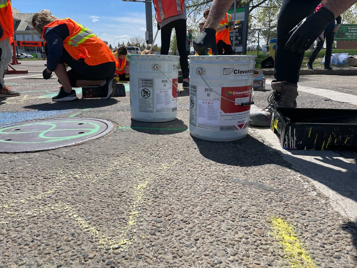 CityofEdmonton's tweet photo. Students and teachers have begun to install their own vibrant crosswalk in Rideau Park! 10 schools will be painting student-designed crosswalks this year through the Vision Zero School Kit program. 

Get involved at https://t.co/WmYSdCM09i. #YEGStreets #SafeStreets https://t.co/oP0H5FMBub