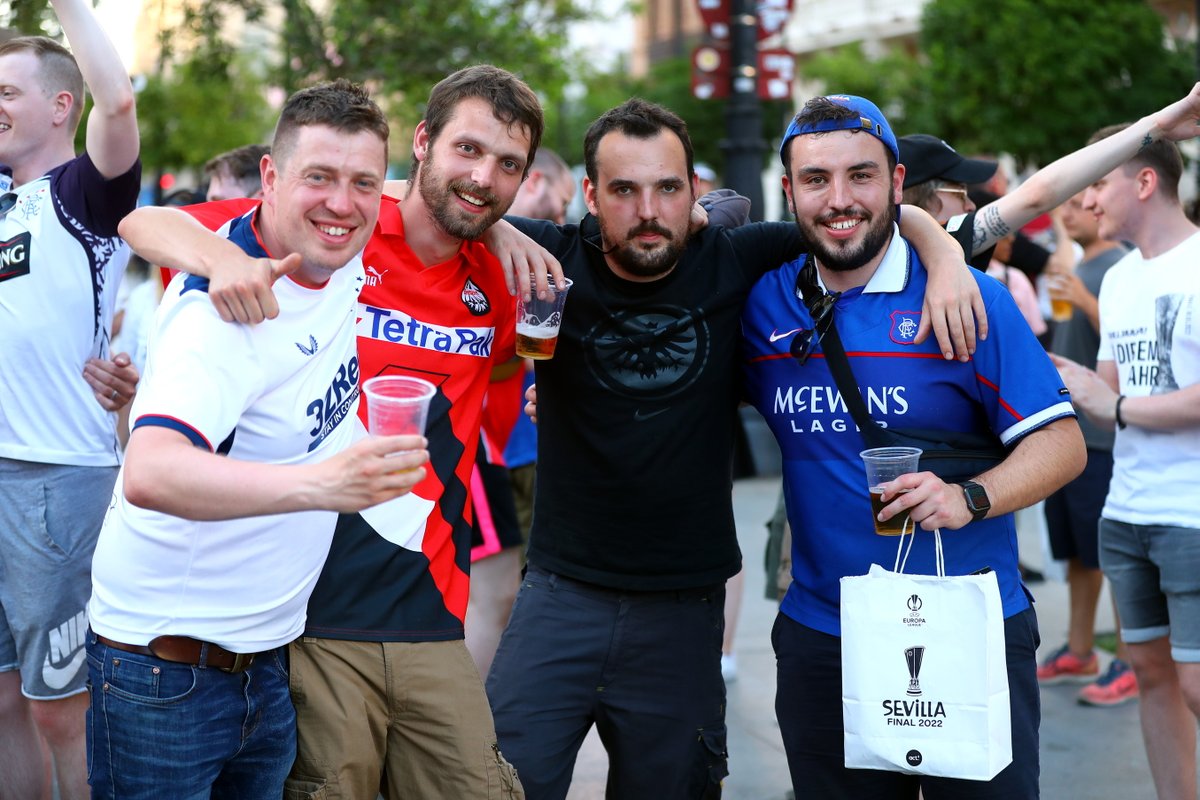 DanWestwell's tweet photo. Don't always believe what you read in the papers. This is what @RangersFC fans have been doing all day and night with @eintracht_us fans around Seville. I've never seen two sets of fans hugging, singing each others songs &amp; wishing each other all the best than I have tonight. https://t.co/rsKJm16GPw