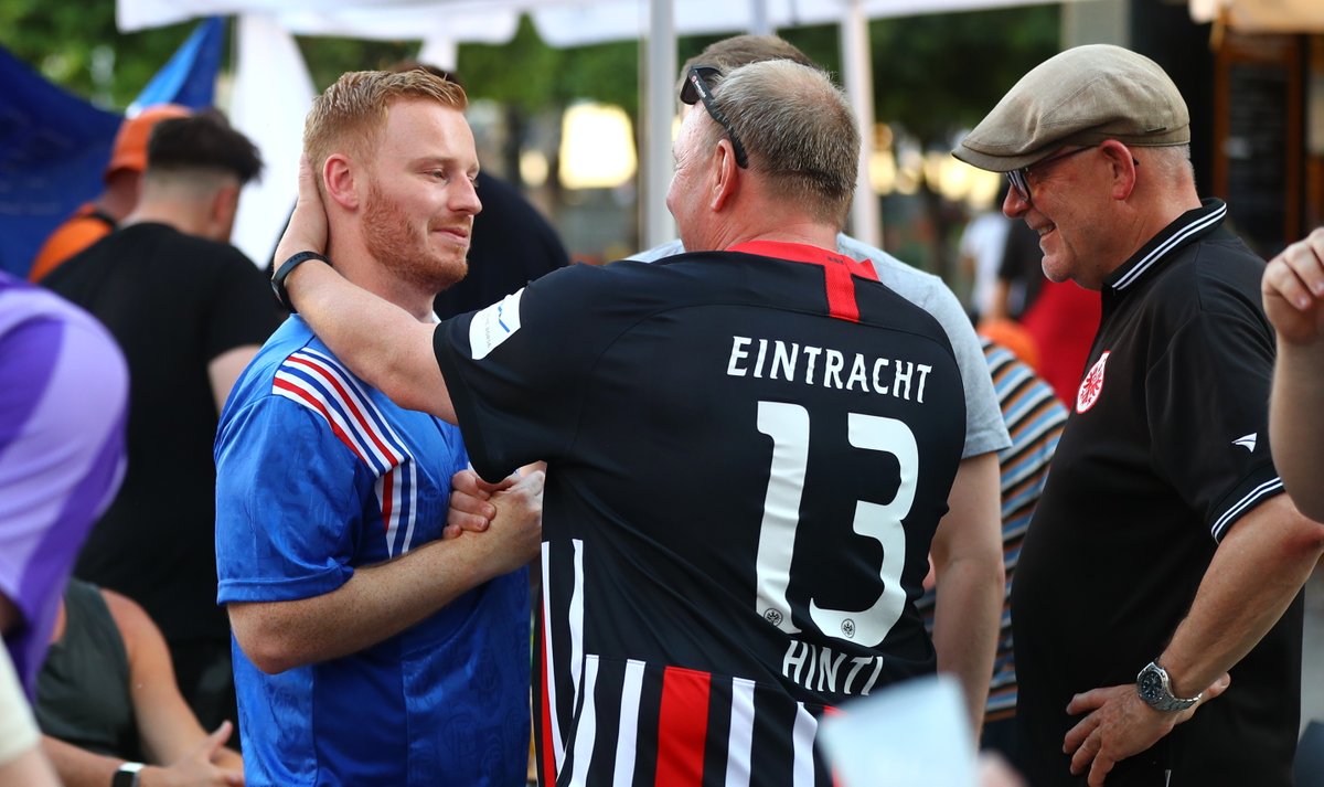 DanWestwell's tweet photo. Don't always believe what you read in the papers. This is what @RangersFC fans have been doing all day and night with @eintracht_us fans around Seville. I've never seen two sets of fans hugging, singing each others songs &amp; wishing each other all the best than I have tonight. https://t.co/rsKJm16GPw
