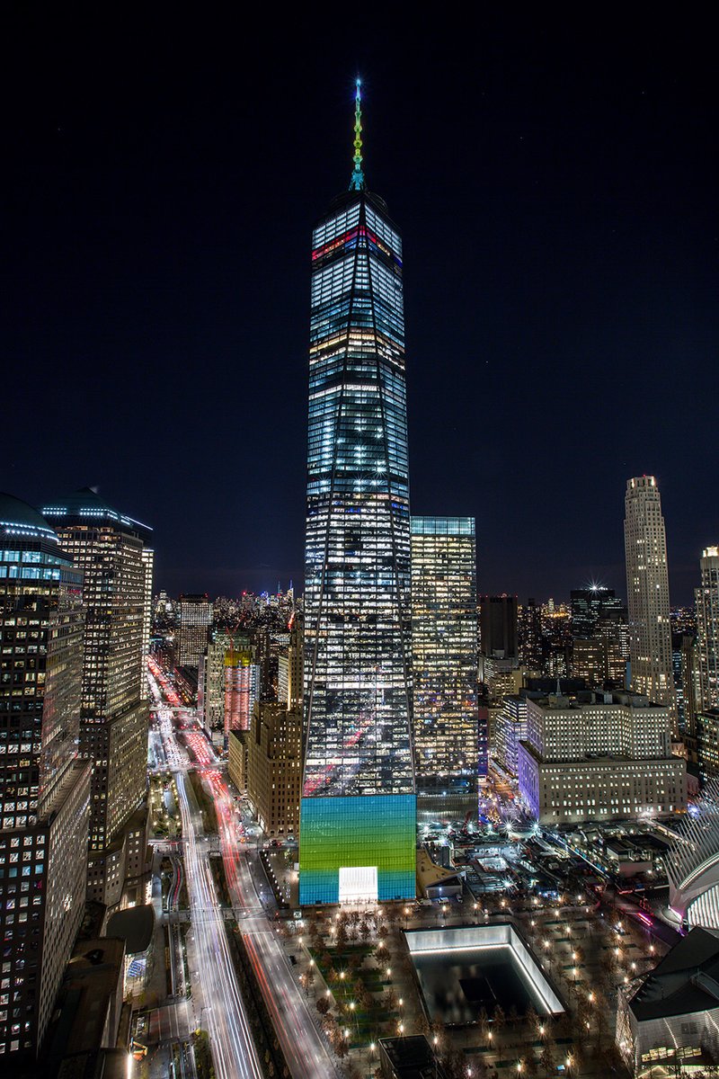 OneWTC's tweet photo. Tonight the spire and podium of #OneWTC will be lit blue and green to raise awareness for Neurofibromatosis. #EndNF #spireworks @spireworks @ChildrensTumor https://t.co/T2bhaXRJVm