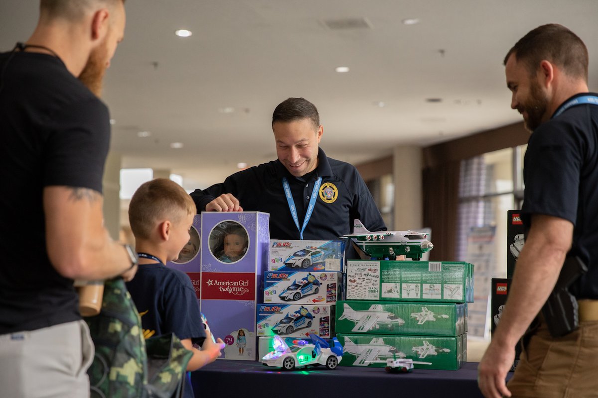 CSX's tweet photo. CSX police agents joined @nationalcops last week to speak with the children of officers who lost their lives in the line of duty and share items donated by @1strcf to help support these grieving families. #CSXPrideInService #NationalPoliceWeek https://t.co/7PeTWCiN4Y