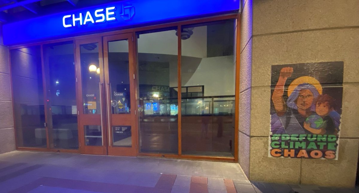 StopMoneyPipe's tweet photo. Well, we never. On the day of @Chase's annual shareholder meeting, activists from #Seattle to #Denver went &amp; painted Chase's walls with a simple message:

#DefundClimateChaos https://t.co/glU7EwGGsc