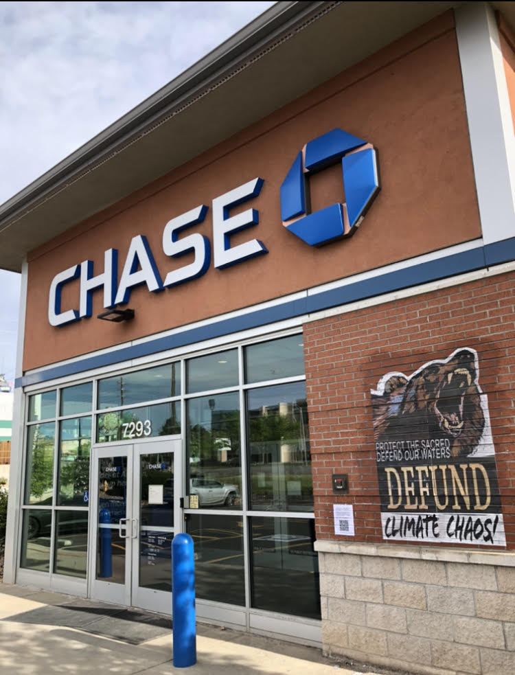 StopMoneyPipe's tweet photo. Well, we never. On the day of @Chase's annual shareholder meeting, activists from #Seattle to #Denver went &amp; painted Chase's walls with a simple message:

#DefundClimateChaos https://t.co/glU7EwGGsc