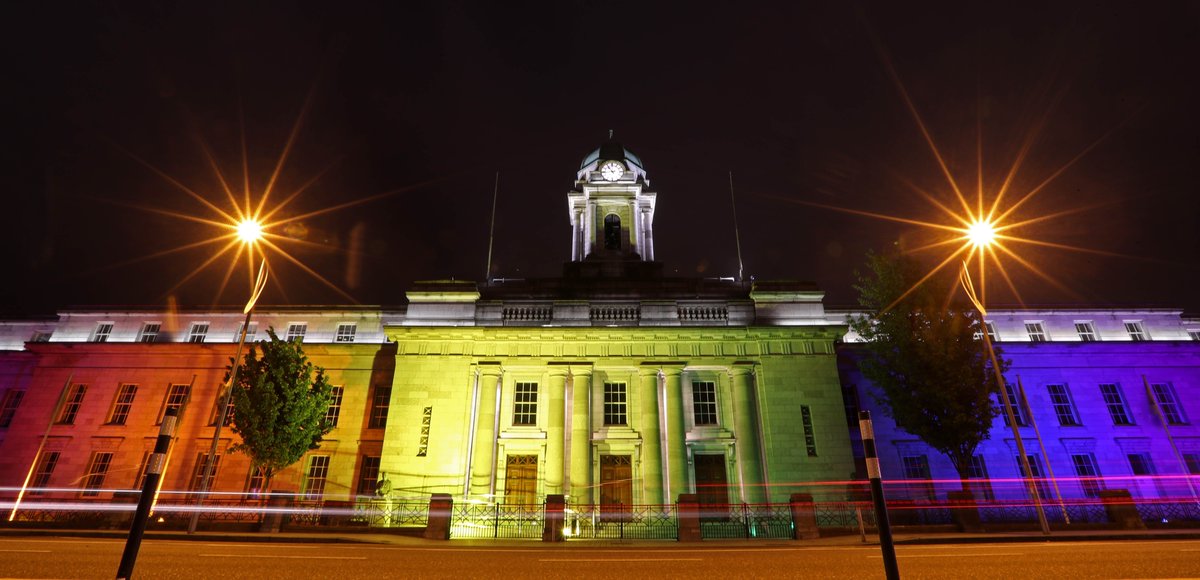 CorkLGBTweek's tweet photo. As night falls on #IDAHOBITDay gorgeous images from #Cork and #Cobh .Thanks to the team @corkcitycouncil for 🌈 lighting of City Hall and Shaky Bridge and huge appreciation of team @WilsonWilkie - Jonathan, Garry & Anne . Thanks too @jmcoughlan for the city pics!! More tomorrow https://t.co/x9L0thbLHa