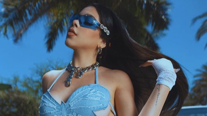 KeniaOSCharts's tweet photo. .@KeniaOS announces her new music video for "Llévatelo". Out on May 26th! https://t.co/ft5J16CKkj