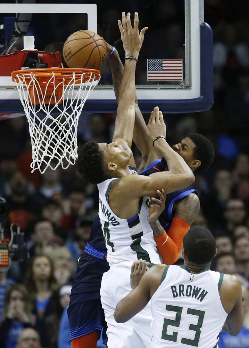 PG13KL2History's tweet photo. paul george putting the freak on a poster. 

a classic photo. https://t.co/wCKwjGYxUV