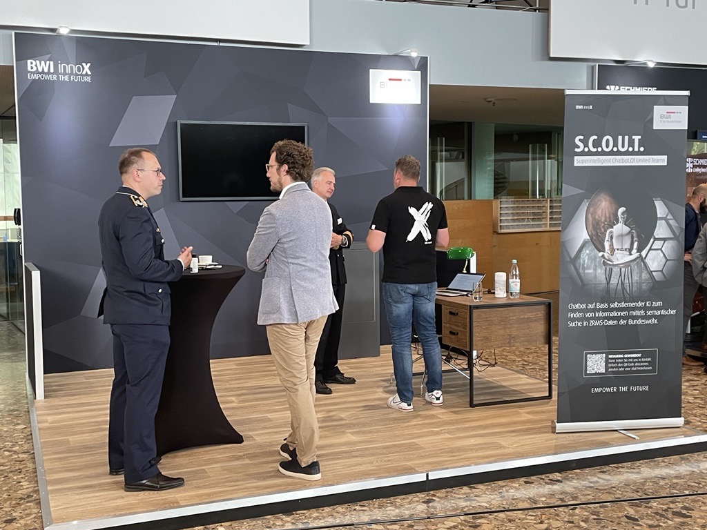 BWI_IT's tweet photo. Chatbot S.C.O.U.T. (Super-intelligent Chatbot of United Teams) unterstützt Mitarbeitende von BWI und @bundeswehrInfo, beispielsweise als Übersetzer oder durch die Suchfunktion. Was er noch so alles kann, erfahren die Gäste der BWI #InnoX|perience am Stand von unseren Experten. https://t.co/jBd1vyzTvd
