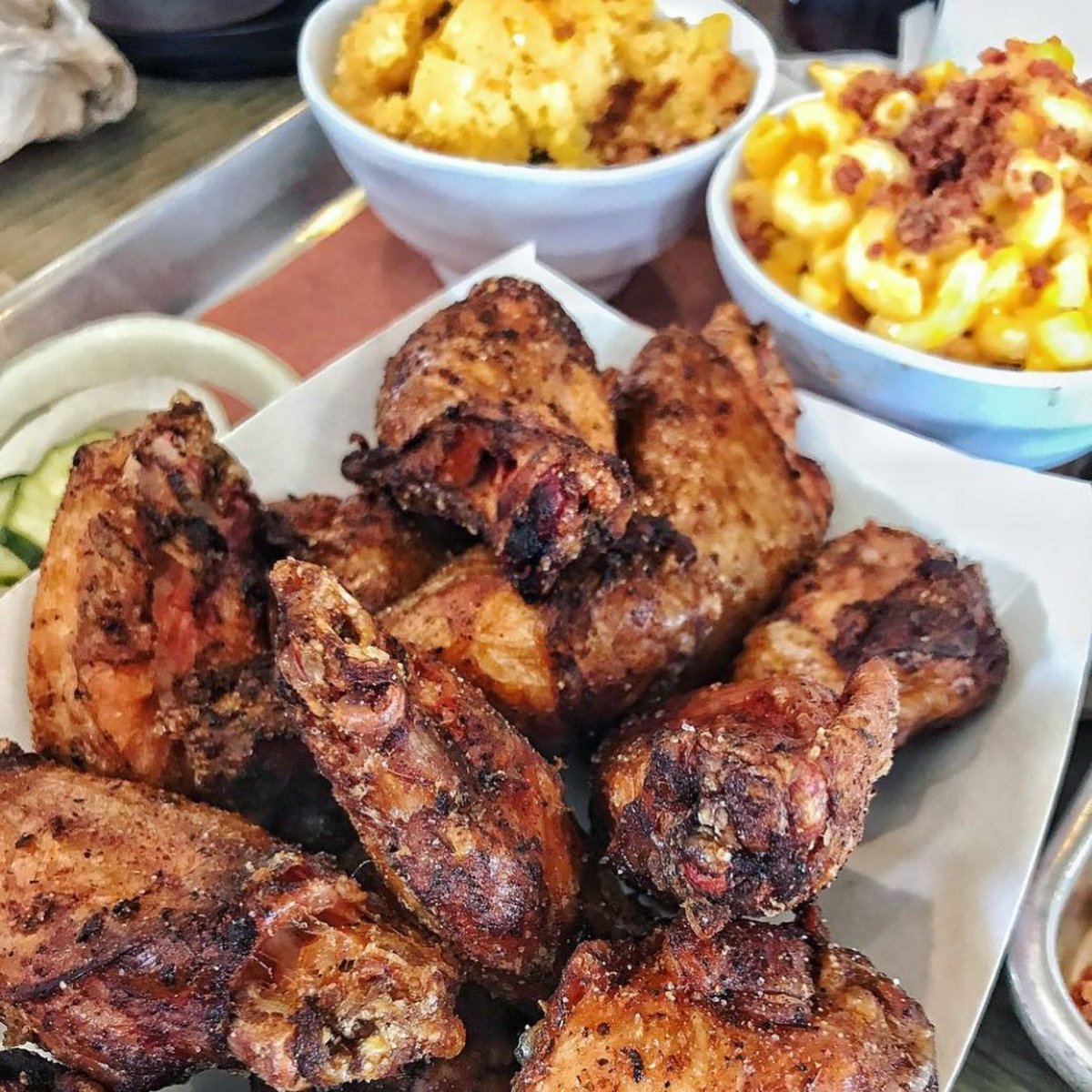 Central_CityBBQ's tweet photo. Fuel your Tuesday with some award winning barbecue and take advantage of our spacious patio seating to soak up all the glory mother nature is dishing out. 🍗☀️🍖
Pssst…treat yourself to a fresh 🧢 from our merch bar, too!
#nolabbq #wherenolaeats #supportlocalnola #nolaeats https://t.co/qgqVCAlISi