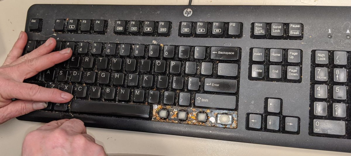 OnSiteCompClean's tweet image. Do you know what&apos;s under your keyboard?
We do!

We clean this gunk out of there. 
How clean is YOUR keyboard...really?