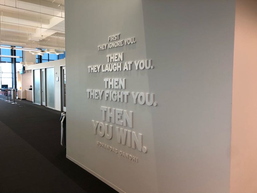 RedHatJobs's tweet photo. Red Hatters, this #RHSummit moment hits home. @PaulJCormier was inspired by this quote that's graced many @RedHat offices. What words have helped you in times of struggle or victory? Drop your comments below ⬇️ #LifeAtRedHat https://t.co/Hxaeh4q9o4