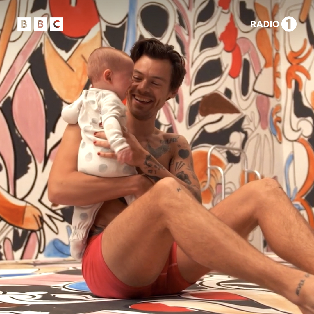 BBCR1's tweet photo. just @Harry_Styles holding a baby...🥺 https://t.co/nkwKPs7sFy