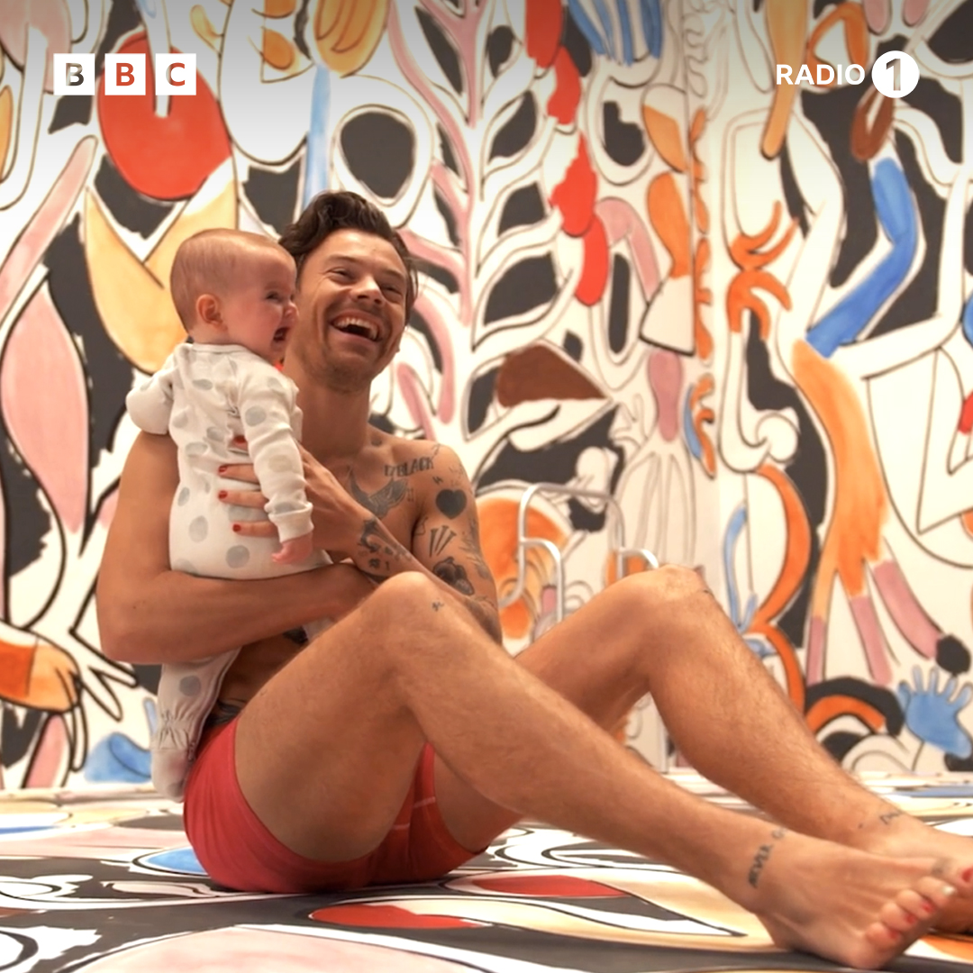 BBCR1's tweet photo. just @Harry_Styles holding a baby...🥺 https://t.co/nkwKPs7sFy