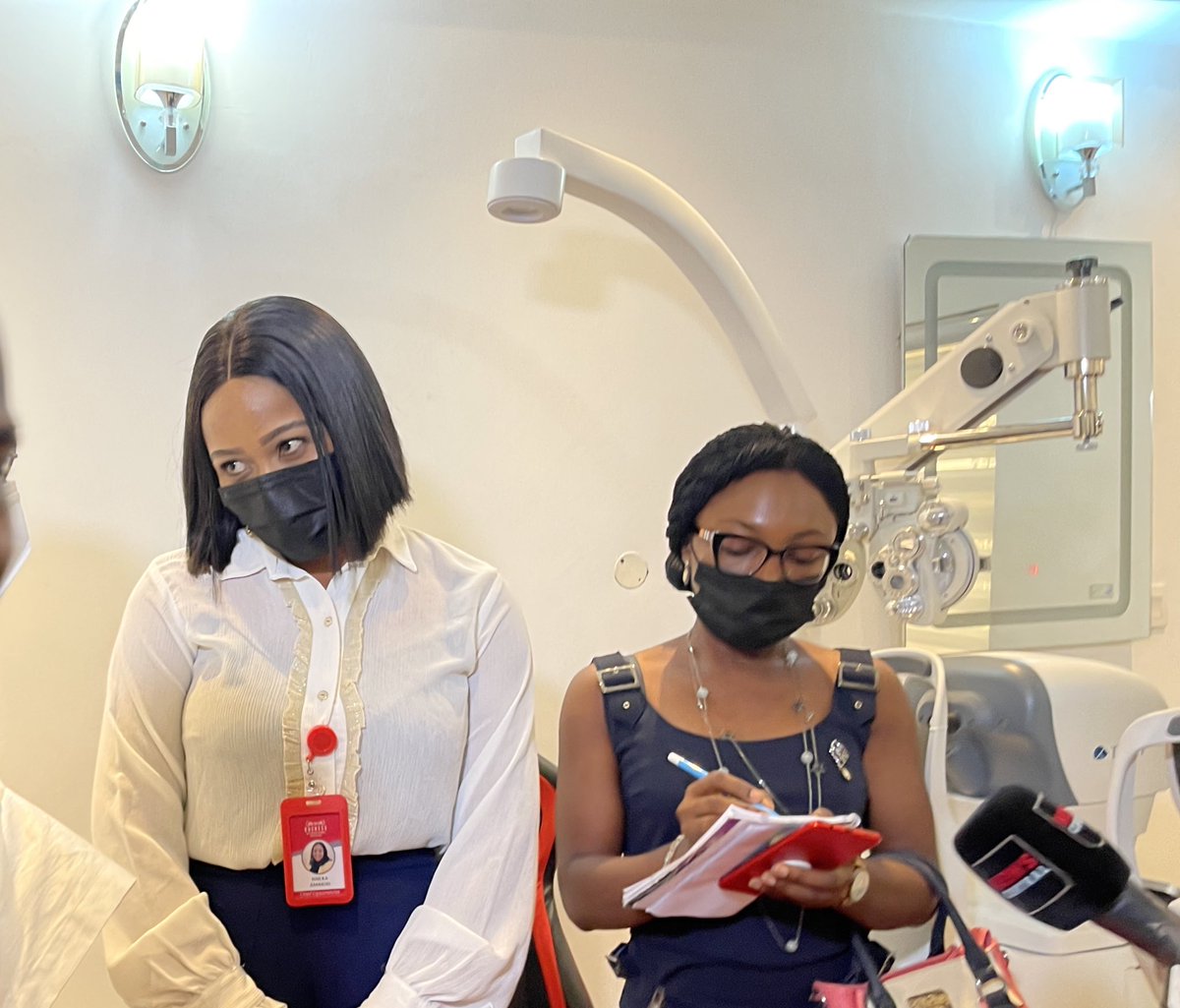 Dr. Adeshida Yewande, a Senior Medical Doctor explaining a procedure to