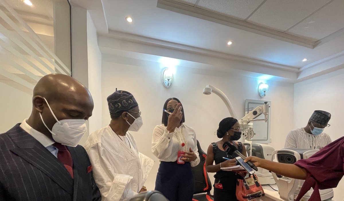 Dr. Adeshida Yewande, a Senior Medical Doctor explaining a procedure to