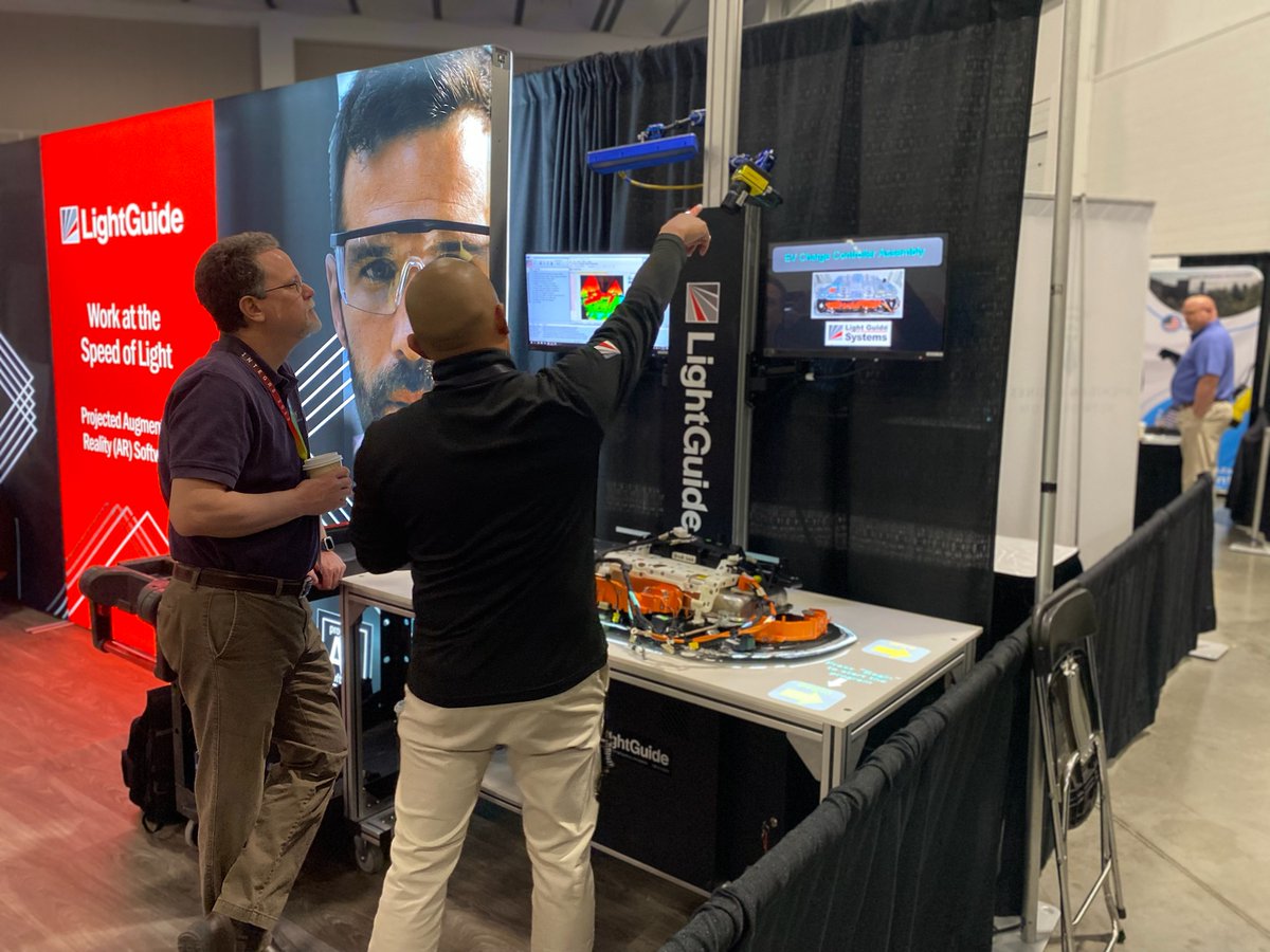 LightGuideInc's tweet photo. Live from #Integr8, where attendees are taking our #AR tech for a test drive! Thanks to @proudtomfrinmi for featuring our #augmentedreality software as part of their Smart Technology showcase. #mfgtech https://t.co/GgQELVGtYt