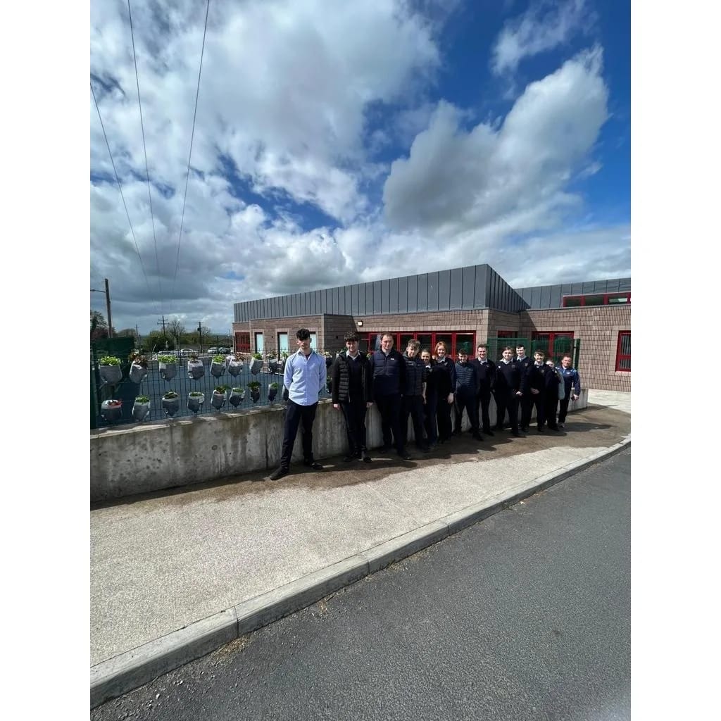ScoilPol's tweet photo. The LCA6 class taking part in the planting of the flowers into the recycled milk carton #flowerwall outside the Hub today. Huge thanks to them, the Green Schools Committee and the TY students who all played their part in creating this wonderful project 🌸🌼💐🌻 @GreenSchoolsIre https://t.co/iZYuXeT0g9