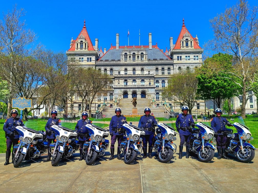 PatrolScpd's tweet photo. Members of our Motorcycle Section traveled to Albany today for the New York State Police Memorial Service. This year, SCPD Lieutenant Robert Van Zeyl was added to the memorial wall among the other fallen heroes from across the state. https://t.co/ypWsYztVSE
