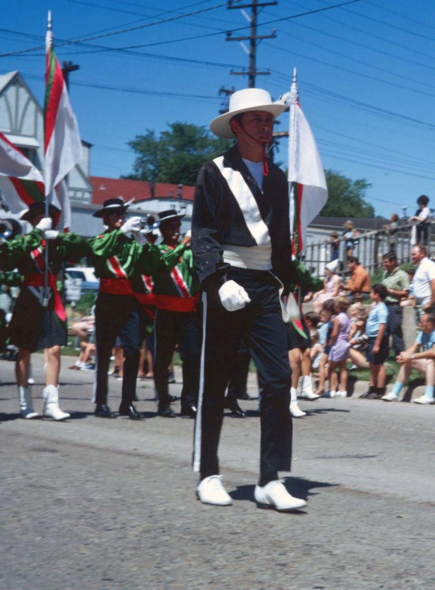 SCV84's tweet photo. In memory of Mike Muñoz, seen below leading SCV in the Streator, Illinois Parade in 1970 and again leading the SCV Alumni corps in 2017. 
#SCV #SCVAC #TNPLSC https://t.co/UrrTYH2ASF