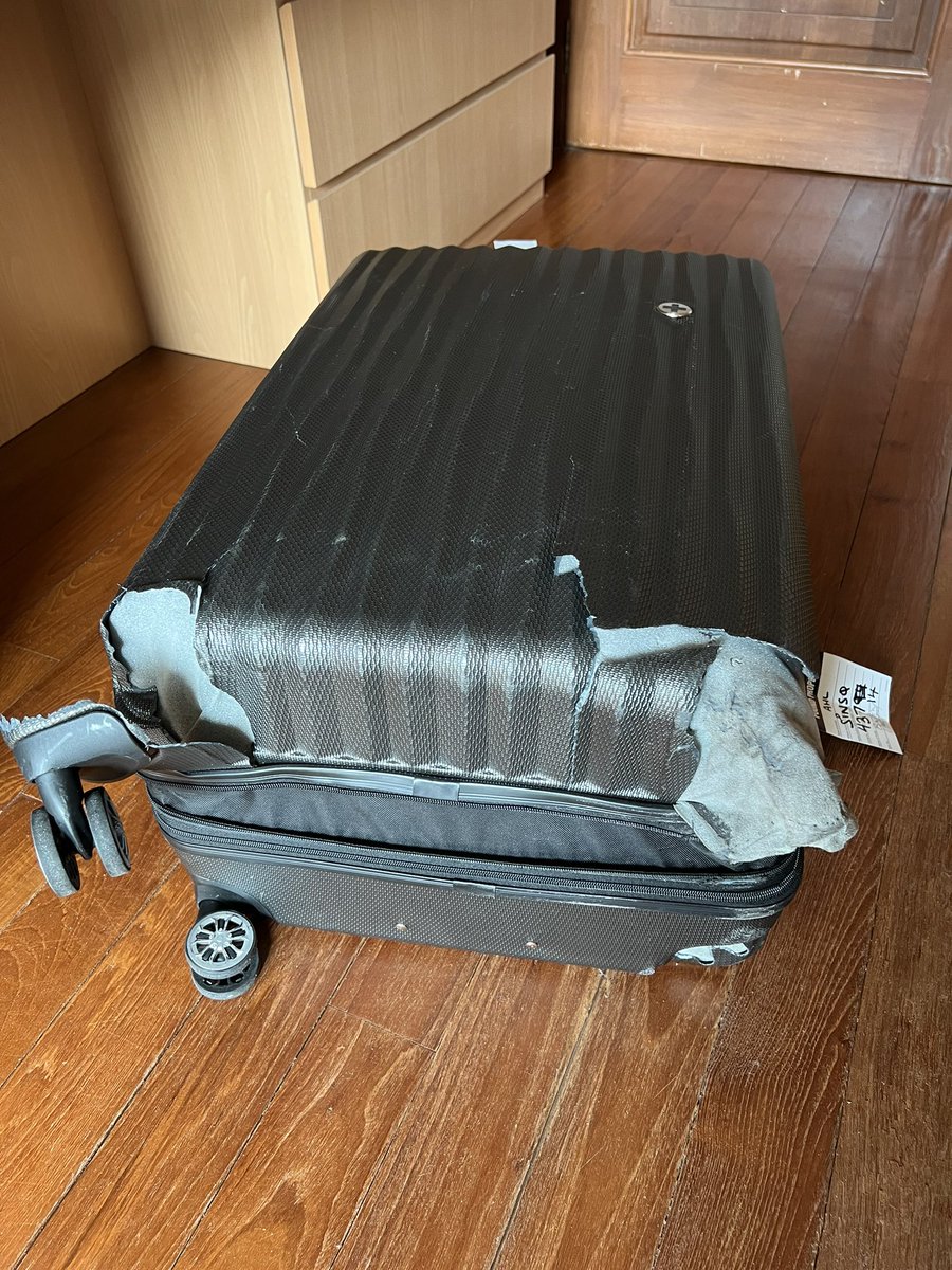 arexroh's tweet photo. @SatsGroup and who are you to unilaterally apply a depreciation on my luggage after you’ve destroyed it? What did y’all do? Drop it out of the plane? https://t.co/pRVemDarOg