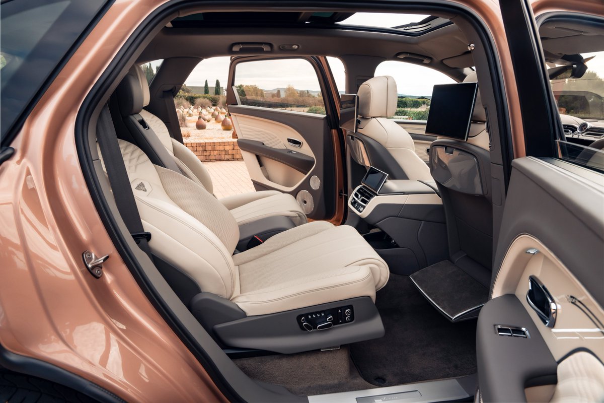 BentleyMotors's tweet photo. All other backseats, take a seat. The new #Bentayga Extended Wheelbase: https://t.co/vYWLxFiD1m https://t.co/SODg4waliN