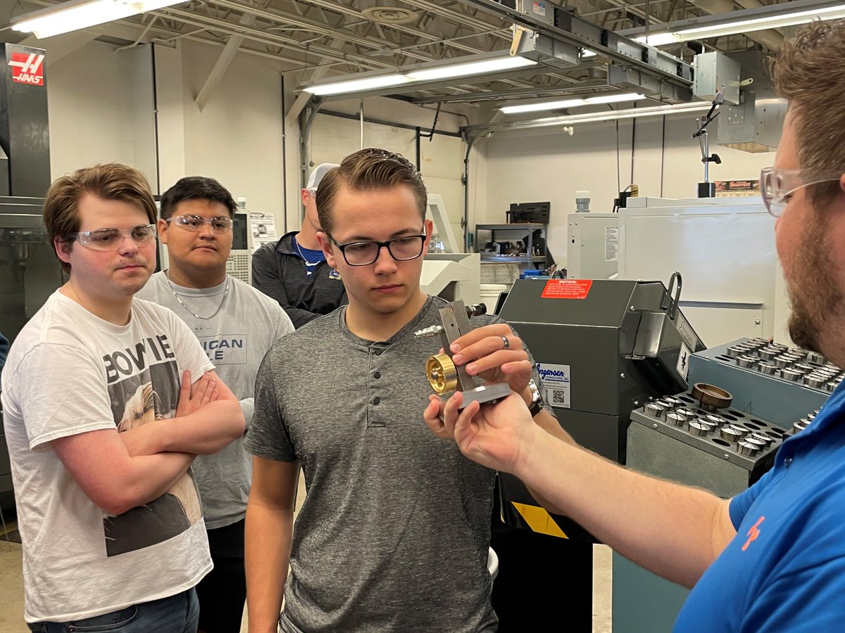 MrsMaxwellOTC's tweet photo. Today the Drafting students visited Precision Machining to view the final results of their collaboration project. This fly wheel was designed to simply the machining process and weigh less than the original, saving time and money and making the air engine run faster. @OTCedu https://t.co/9Eu6cr8fEI