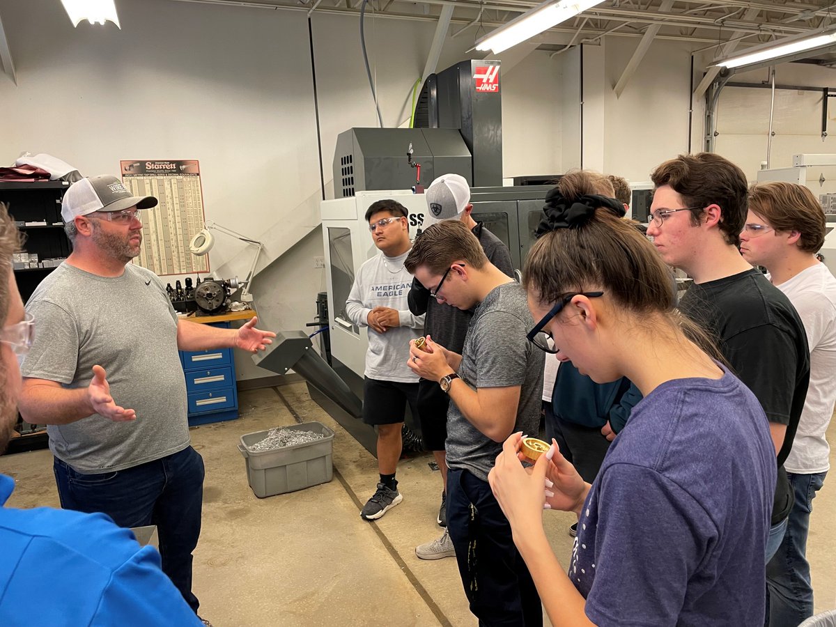 MrsMaxwellOTC's tweet photo. Today the Drafting students visited Precision Machining to view the final results of their collaboration project. This fly wheel was designed to simply the machining process and weigh less than the original, saving time and money and making the air engine run faster. @OTCedu https://t.co/9Eu6cr8fEI