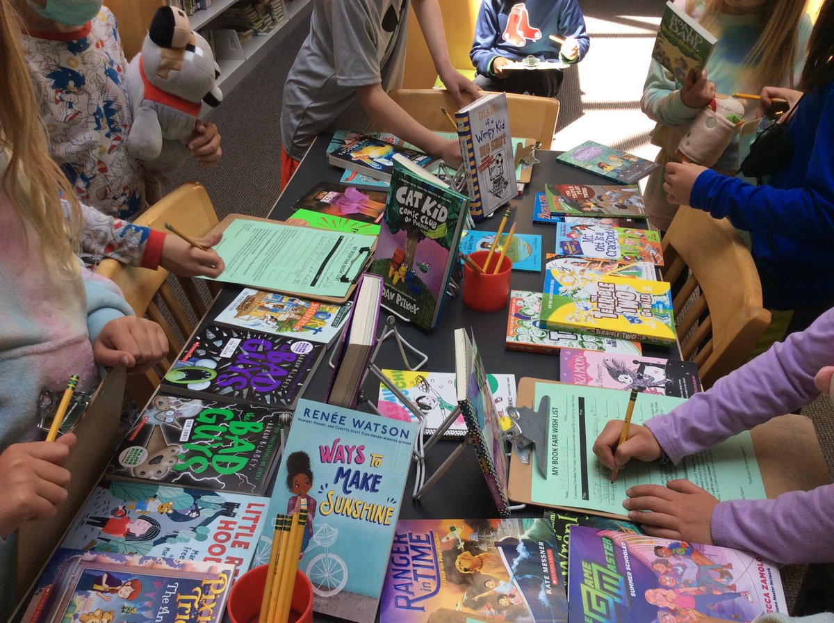 ambroselibrary's tweet photo. Ss are making wishlists for our annual book fair, and then enjoying reading the library books they checked out. It’s also pajama day for this class! Another great day in the library! @AmbroseSchool https://t.co/LFBK3L6dYS