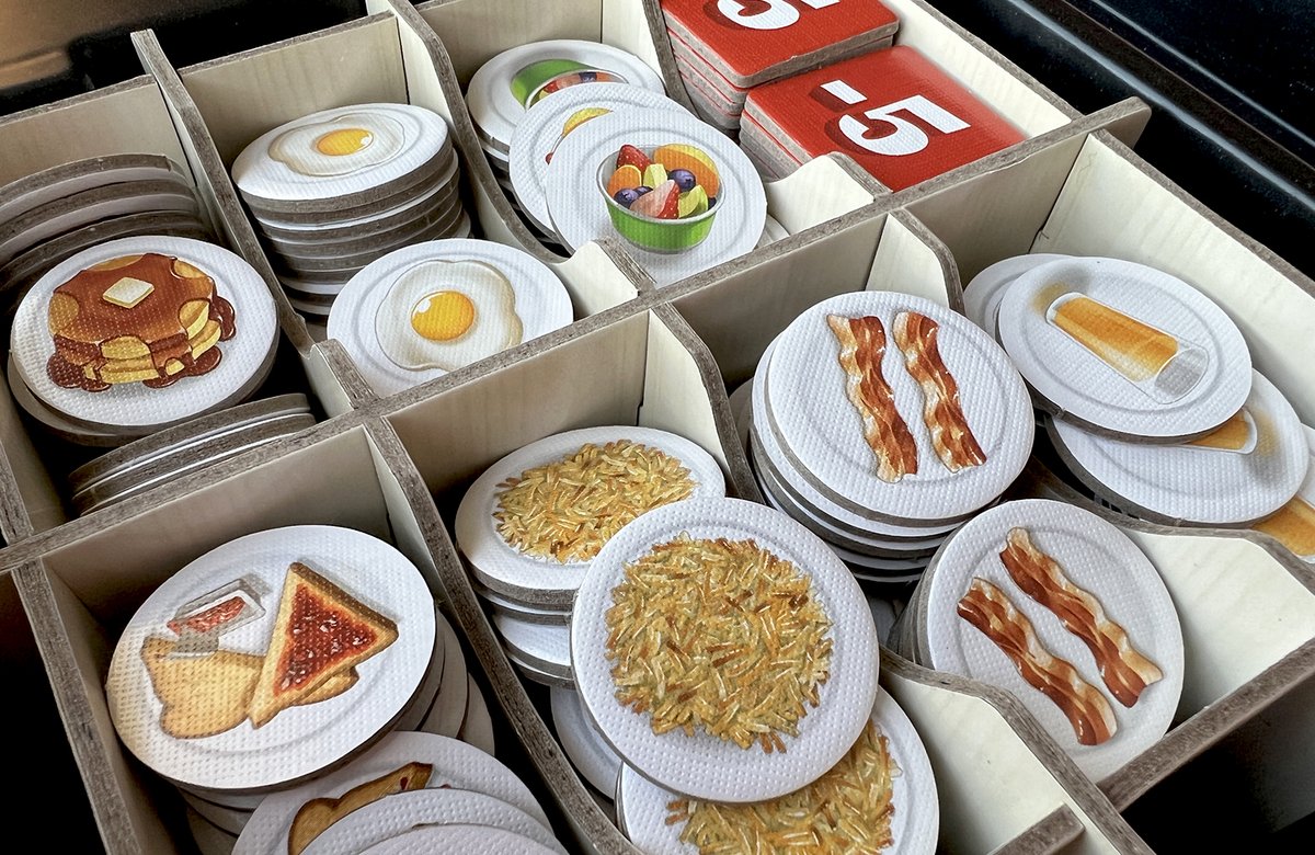 MeepleMaven's tweet photo. Seeing more #boardgamestorage trays shipped with games. Nice but tricky if the game box isn't stored horizontally. Some are v good one but generally I prefer no insert at all. Minority opinion, perhaps, but def not alone as I see many who have also ditched the original inserts. https://t.co/NQJAK14yqZ