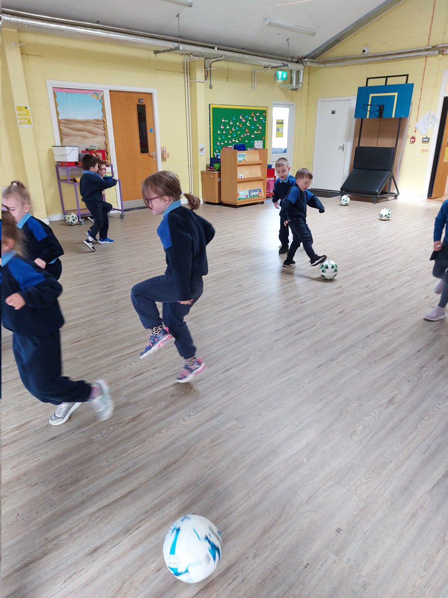 breslin_ms's tweet photo. Action shots of our football skills. The boys and girls and loving learning each week. Thanks again @MoorefieldGaa ⚽️ https://t.co/kH93Yqyq0W