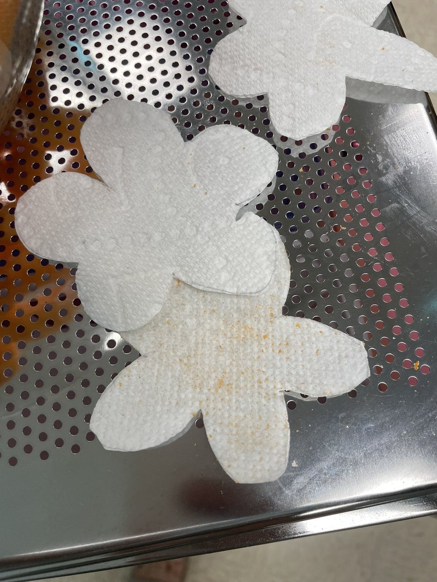 Pollination experiment! Our hands (bees) were digging through the pollen (cheese puffs) to get to our sweet nectar (jolly ranchers). Then passing it along to our flowers (paper towels) 🌸 🐝 🌼