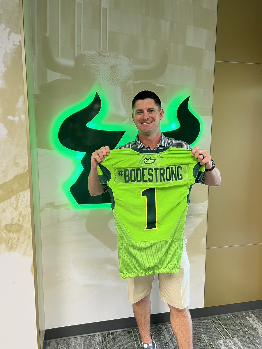 coach_jeffscott's tweet photo. Bode…we have this special jersey coming your way soon. Want you to know that all of our players, coaches and staff @USFFootball are pulling for you everyday. Look forward to having you out to one of our practices later this fall🤘 #Bodestrong #HulkSmashLeukemia #USFTwitterHerd https://t.co/SJo9fQ1A7w