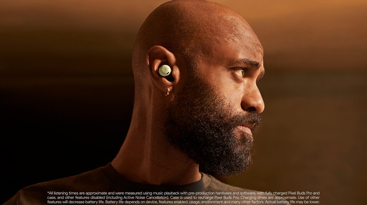 Man looking to his left wearing Pixel Buds Pro in Lemongrass in his right ear. 