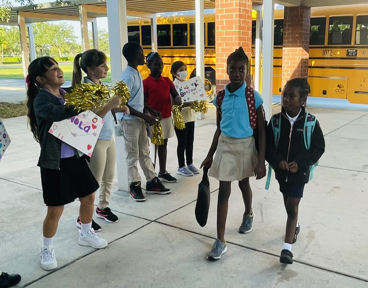 MrsSMendozaCPE's tweet photo. #InternationalCafe greeting bus riders this morning! #diversity #connections #ELs #Newcomers @blackbearsroar https://t.co/gjfKCf301H