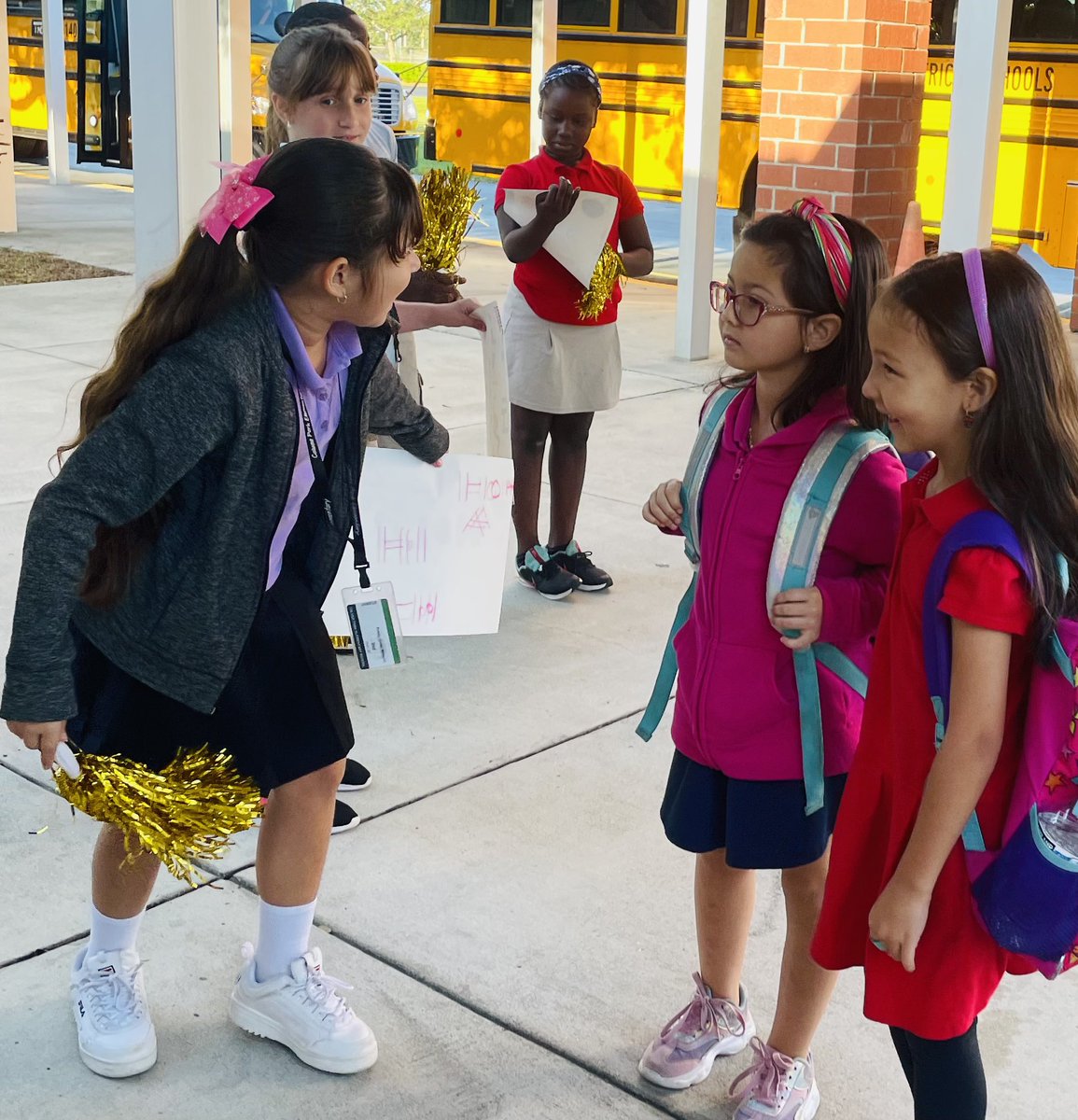MrsSMendozaCPE's tweet photo. #InternationalCafe greeting bus riders this morning! #diversity #connections #ELs #Newcomers @blackbearsroar https://t.co/gjfKCf301H