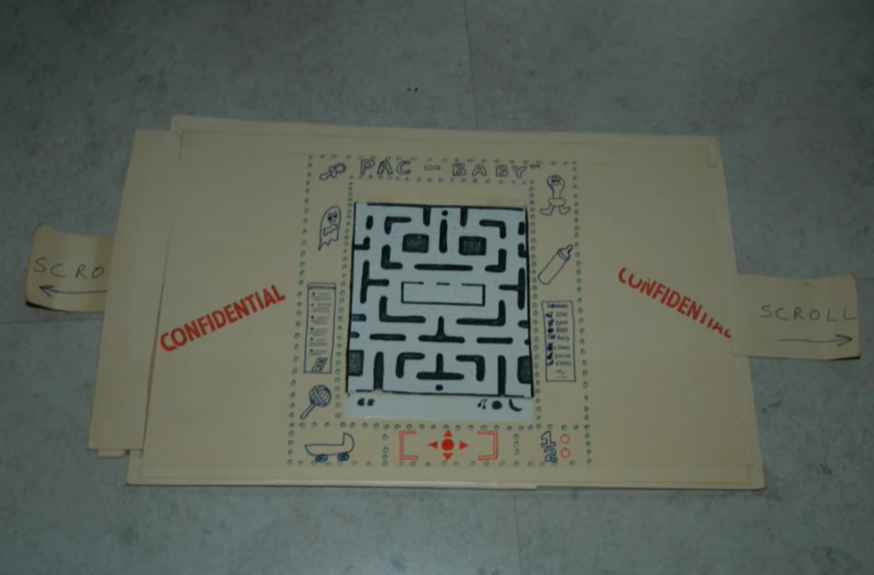 DailyPacMan's tweet photo. In order to successfully pitch the maze-scrolling concept of Jr. Pac-Man, GCC crafted a cardboard prototype designed so pulling on the sides would reveal more of the maze displayed in the center. https://t.co/fq6It6Vc6X