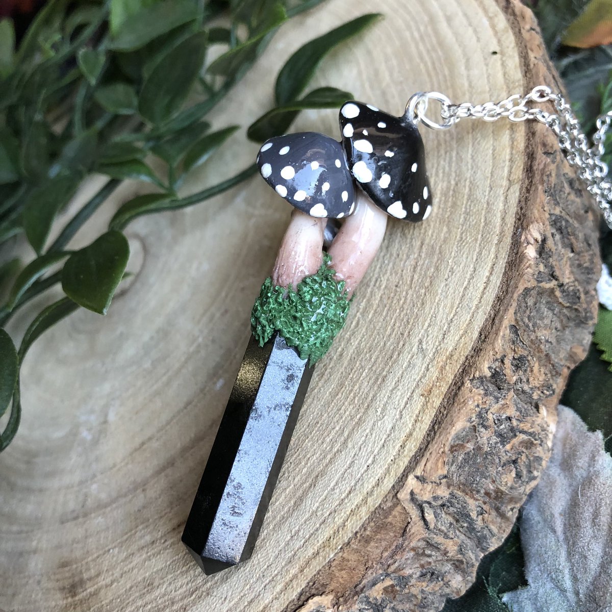 GraceEveArt's tweet image. I love this black tourmaline mushroom pendant I sculpted. It has grey &amp;amp; black caps🖤✨