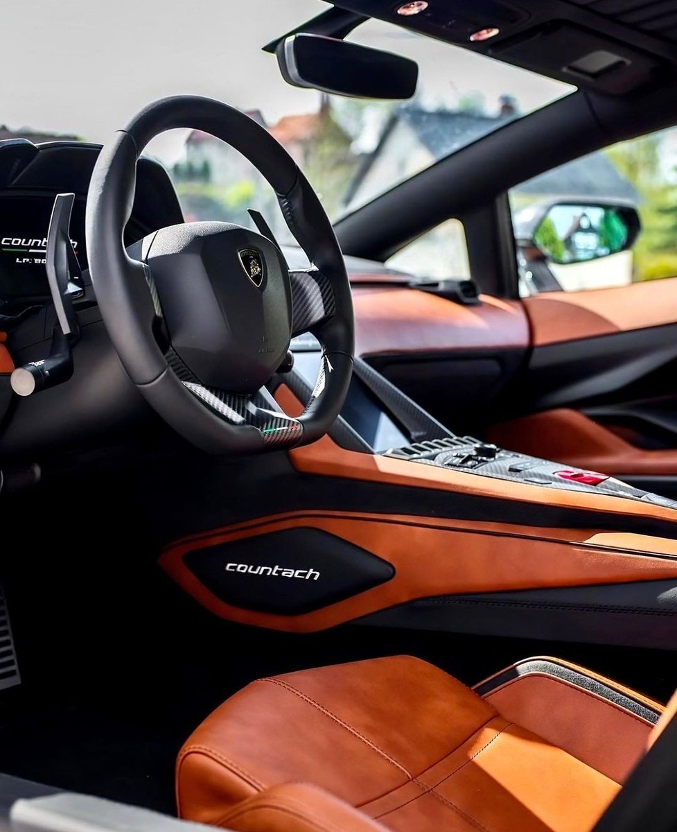 DailyLamboTM's tweet photo. Lamborghini Countach spec'd in black with bronze wheels and tan interior https://t.co/PX1ifepHGf